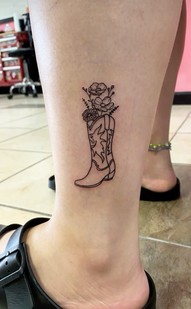 cowboy boot tattoo