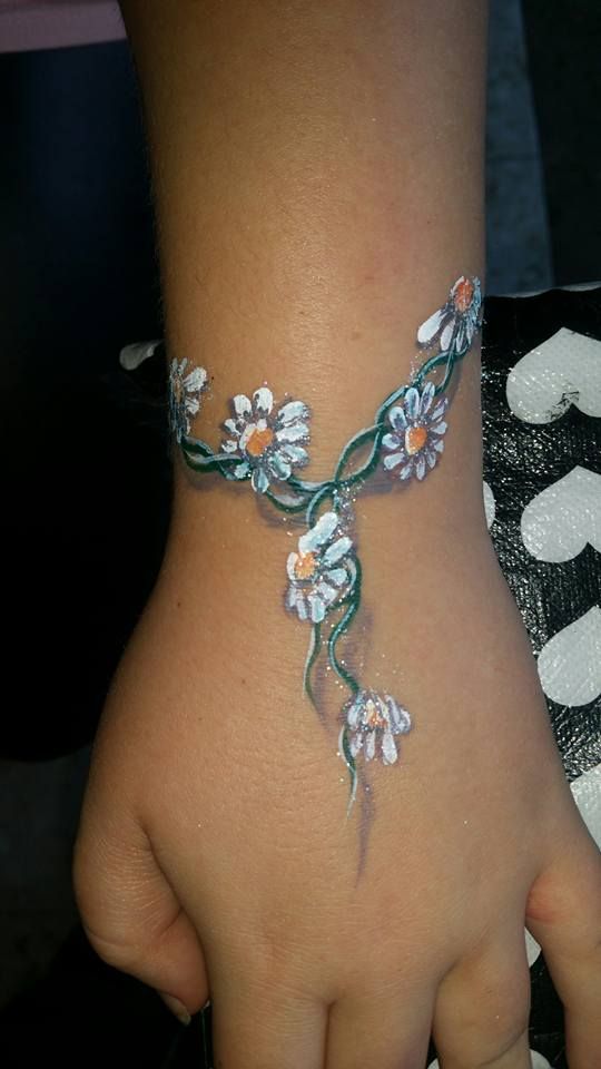 Creations Professional Face Painting | Flower tattoo arm, Daisy chain tattoo,  Chain tattoo