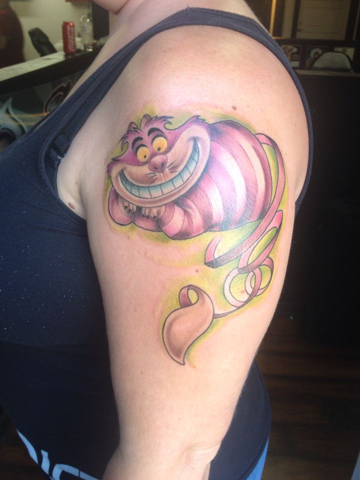 Cheshire Cat tattoo | Wonderland tattoo, Cat tattoo designs, Tattoos