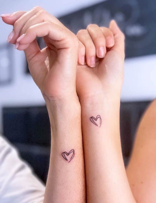 Cherished Bonds: Small Mother-Daughter Tattoos with Deep Meanings