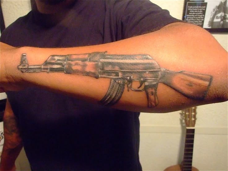 Ak47 tattoo forearm