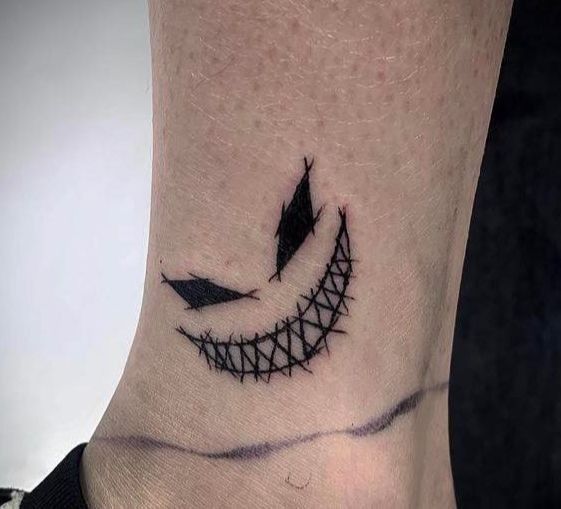 Haunted Art: 10 Scary Tattoo Designs That Will Make You Scream"