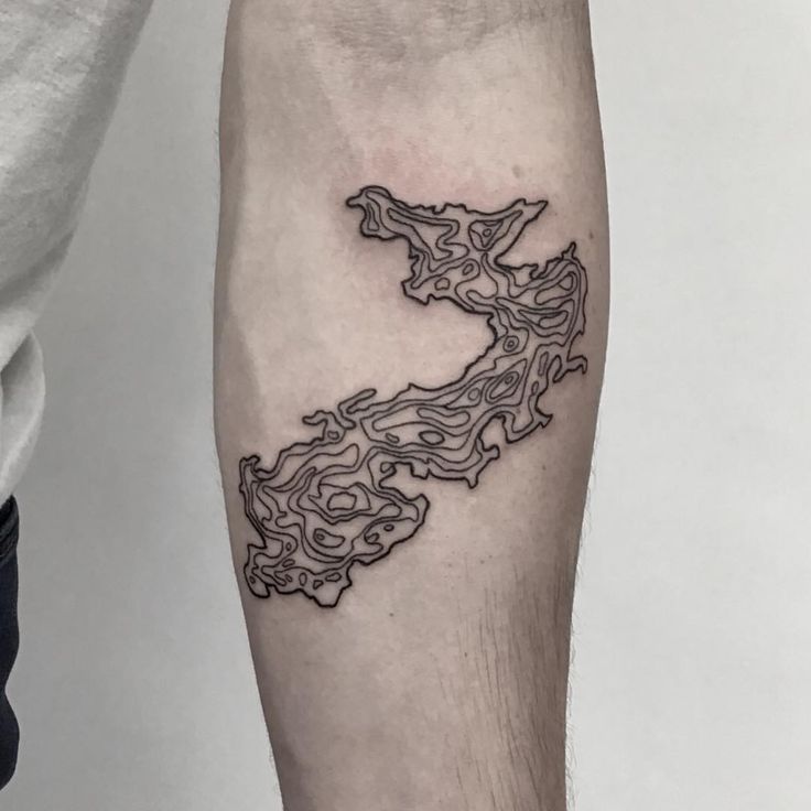 Topographical map of a lake tattoo by Kevin Jenkins - Tattoogrid.net