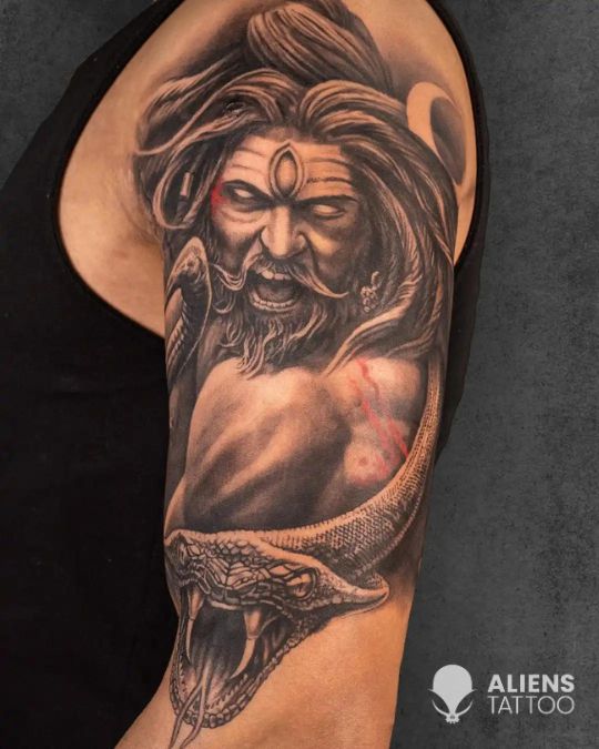 Angry Lord Shiva with Serpent: Striking Realism Tattoo Art