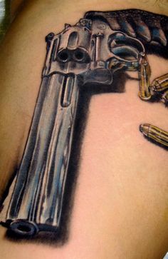 Gun tattoo