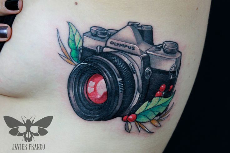 olympus camera tattoo by javier franco