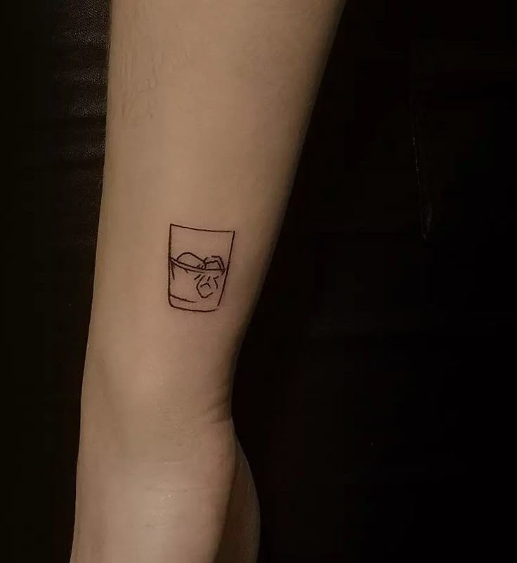 Whiskey glass tattoo