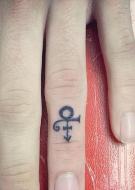 Women Are Getting the Cutest Tiny Tattoos in Honor of Prince