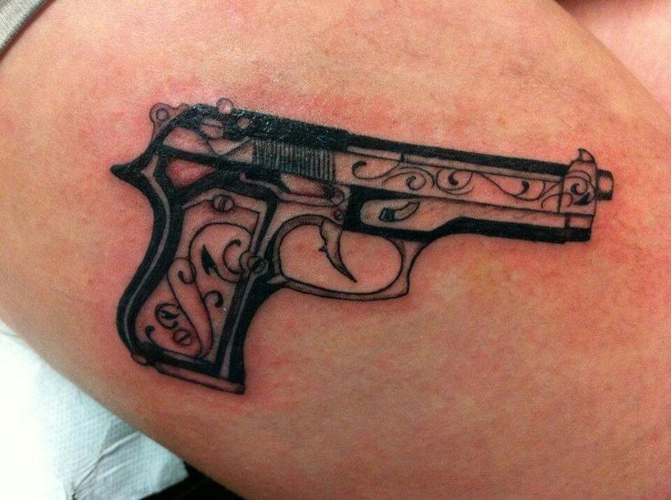 Gun tattoo