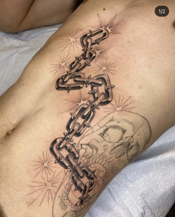 Pin by jk <3 on tattoo ideas | Chain tattoo, Black ink tattoos, Body art  tattoos