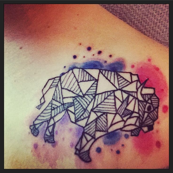 Watercolor buffalo tattoo