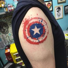 Pin by Romaric on Tattoo gallery in 2025 | Captain america tattoo, Ripped  skin tattoo, Nerd tattoo