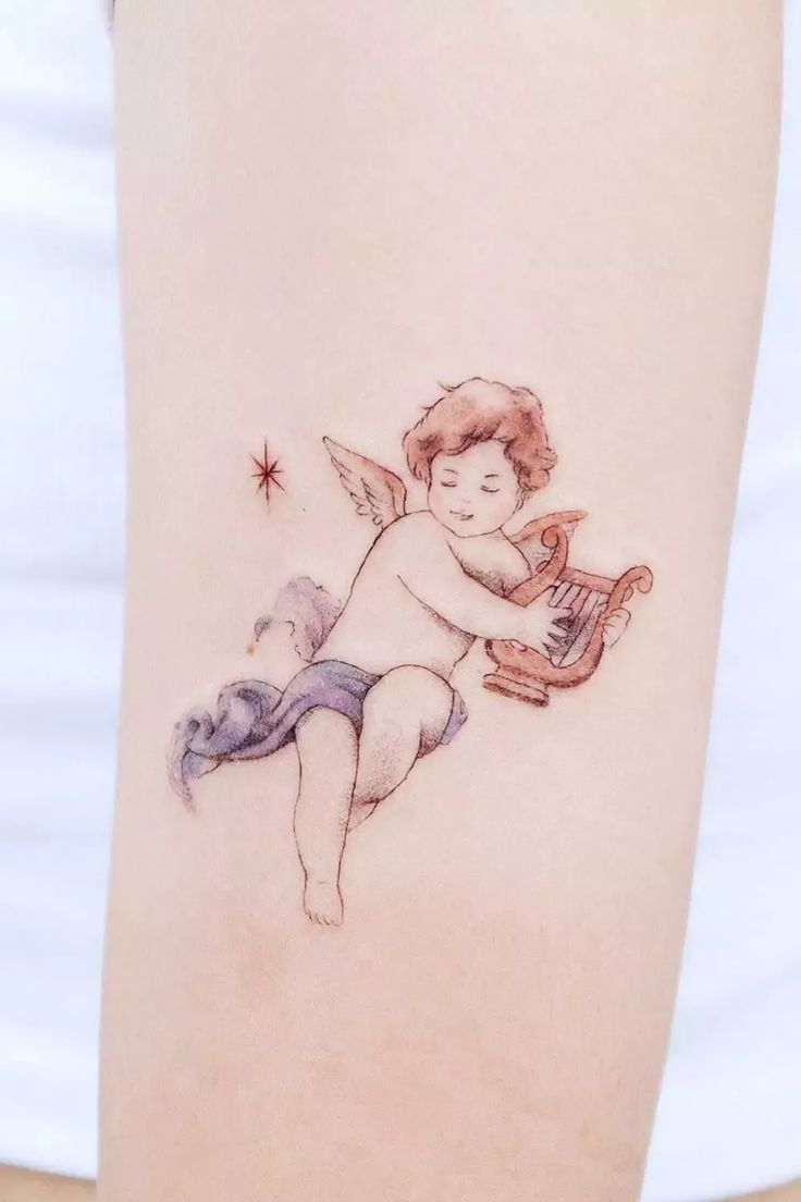Baby Angel Playing Harp Tattoo Design