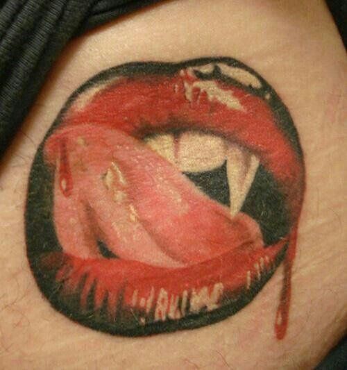 Vampire lips tattoo
