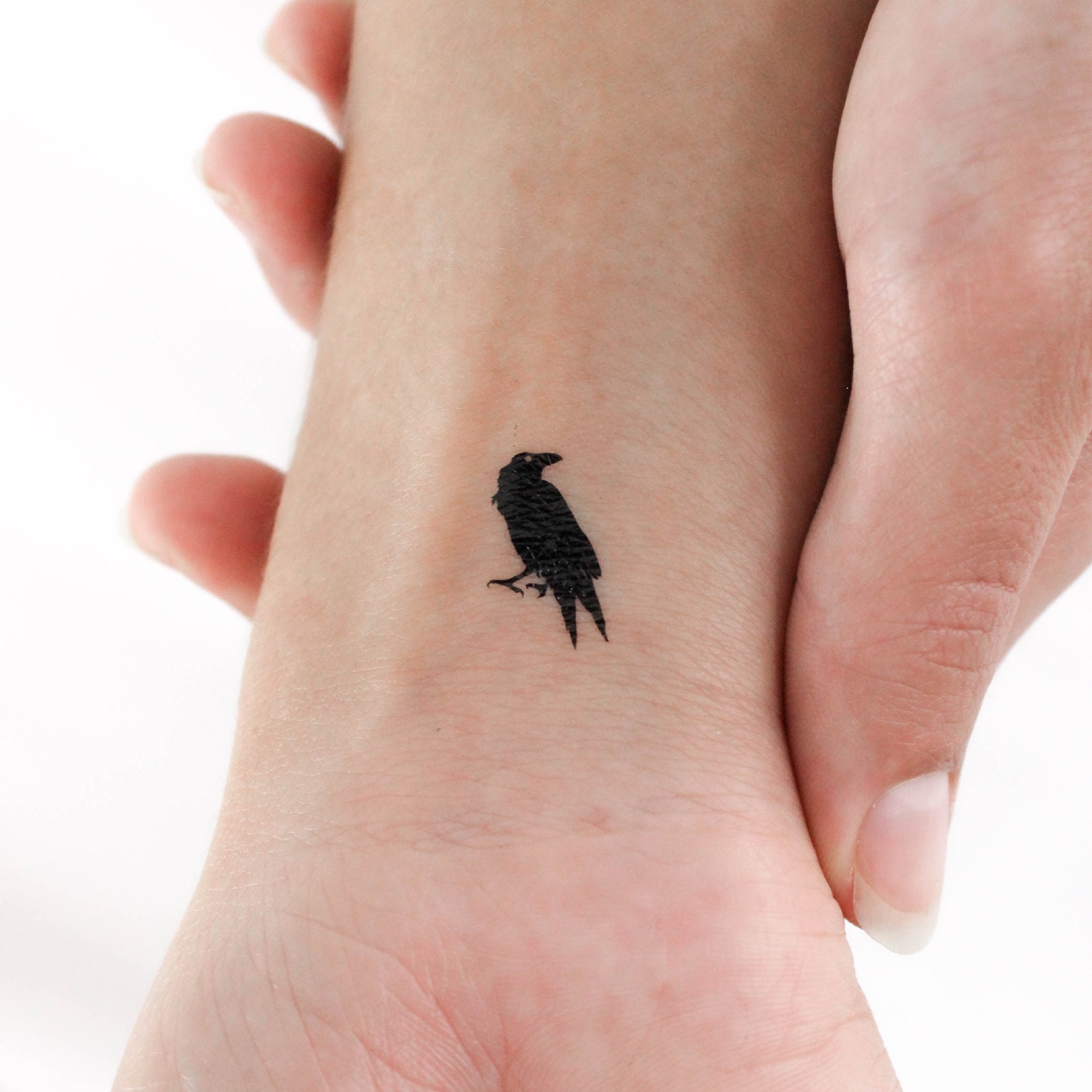 Minimalist Crow Tattoo