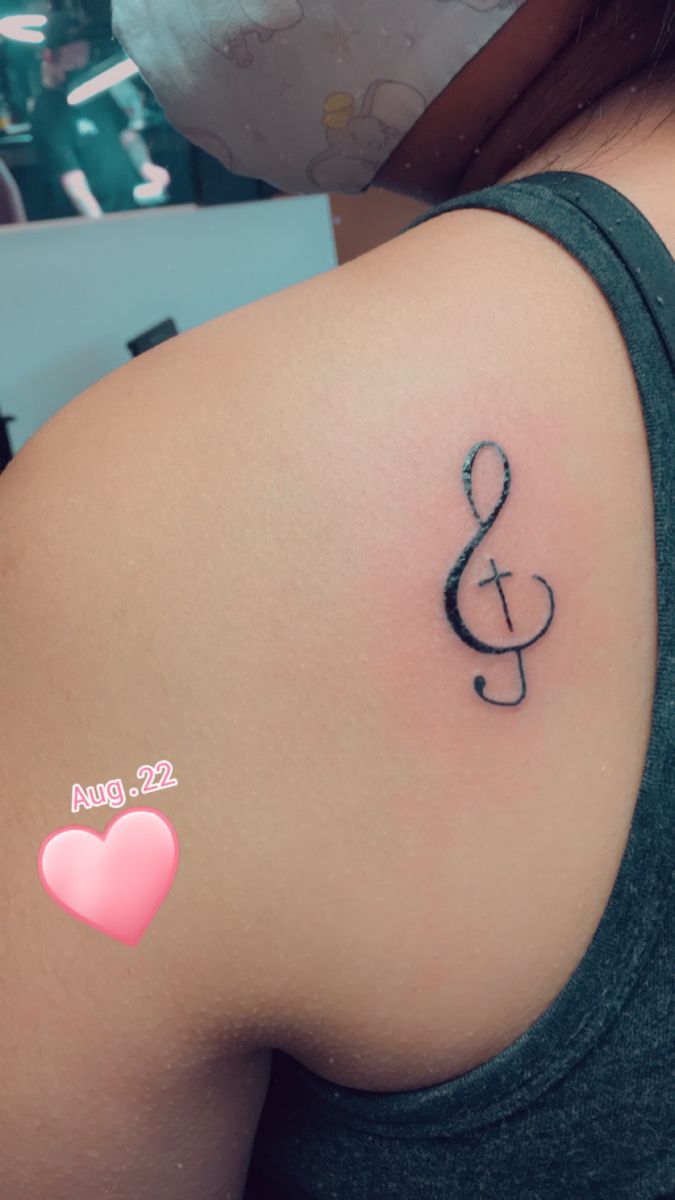 Christian music tattoo / treble clef cross
