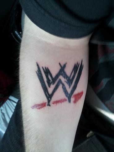 WWE logo tattoo <3