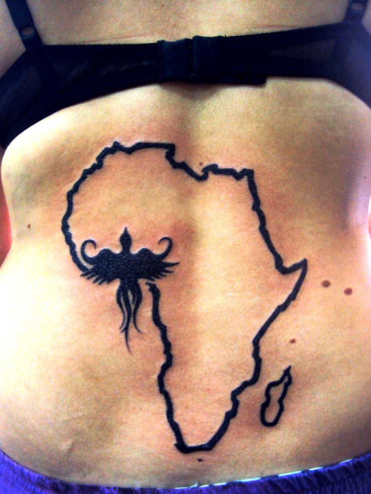 map of Africa tattoo with a tribal Phoenix represantation over Ghana. :)