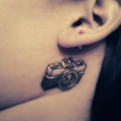 My lil camera tattoo behind my ear. Probably my fav tattoo.