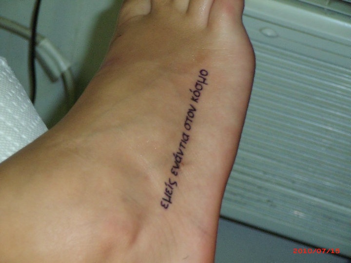 first tattoo: in greek "emeis enanthia ston cosmo" translation: us against  the world