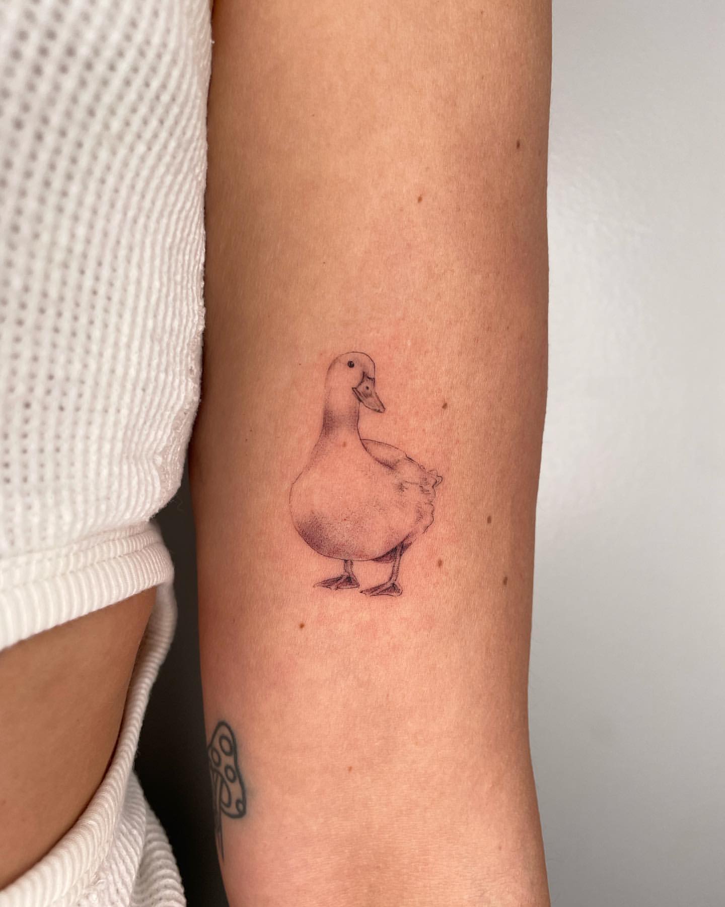 Fine Line Duck Tattoo