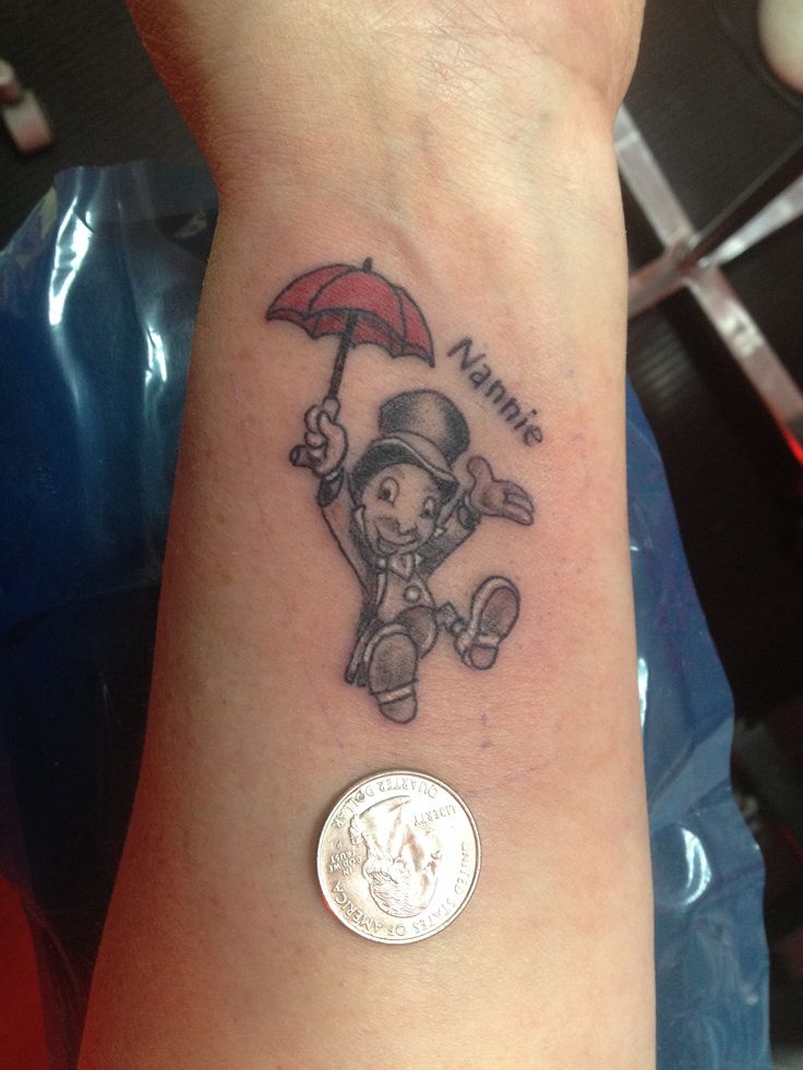 Small jiminyCricket tattoo