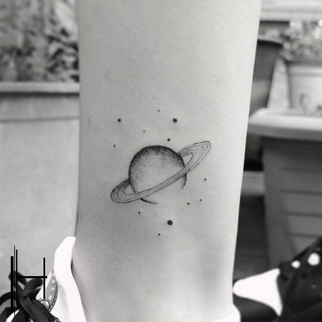 40 Lovely Planet Tattoo Designs and Meanings - TattooBloq
