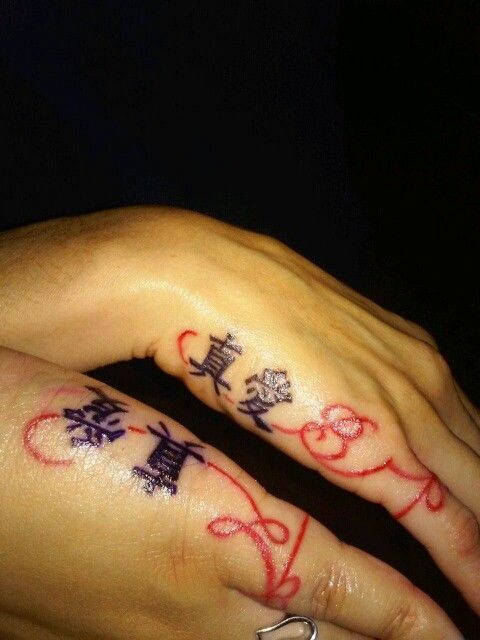 Bri and I's tattoo, red string of fate with true love in chinese and our initials!