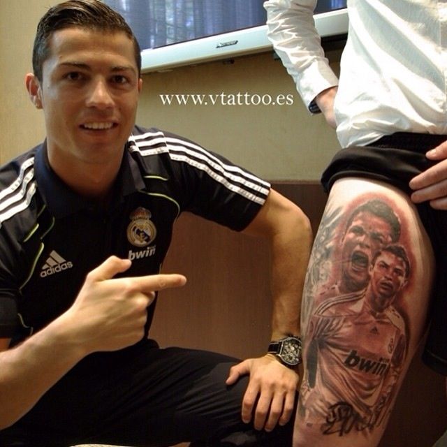 Cristiano Ronaldo with a fan tattoo. bahAHhahahaha omg too good
