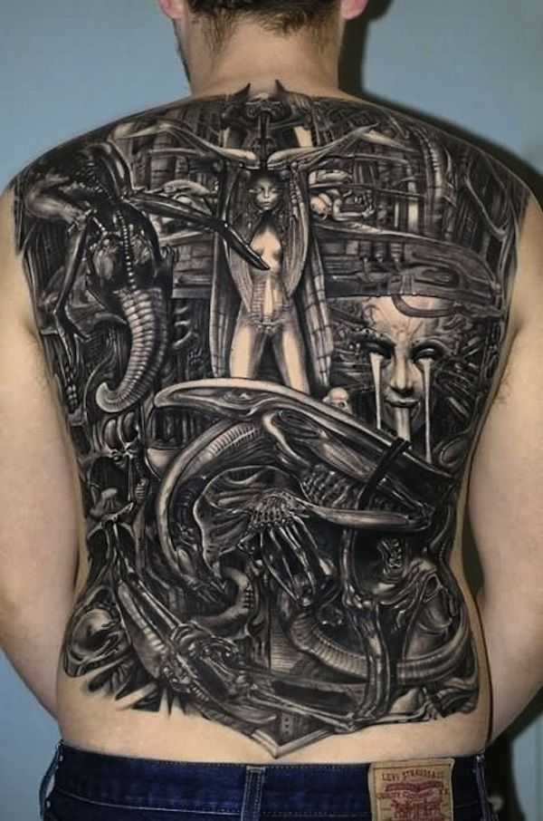 H.R. Giger works on back tattoo