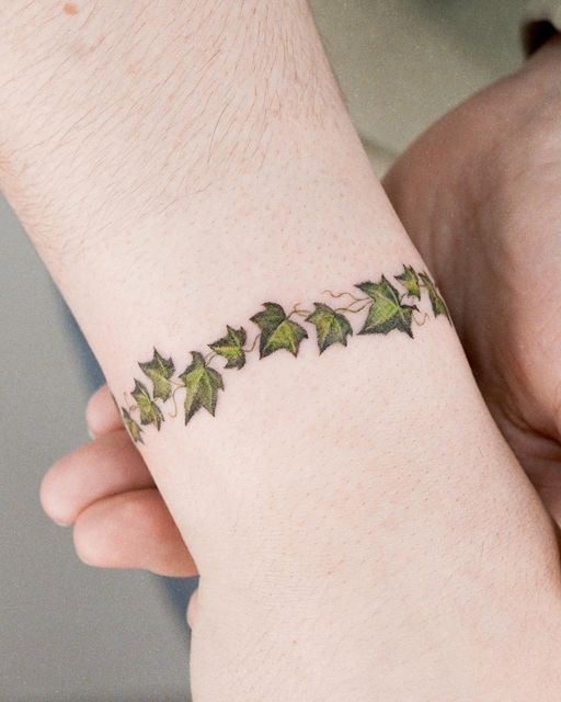 Discover 7 Ivy Tattoo Ideas and Small Ivy Tattoo Ideas | ivy flower tattoo,  holly bush tattoo, wrist thumb tattoos for women and more