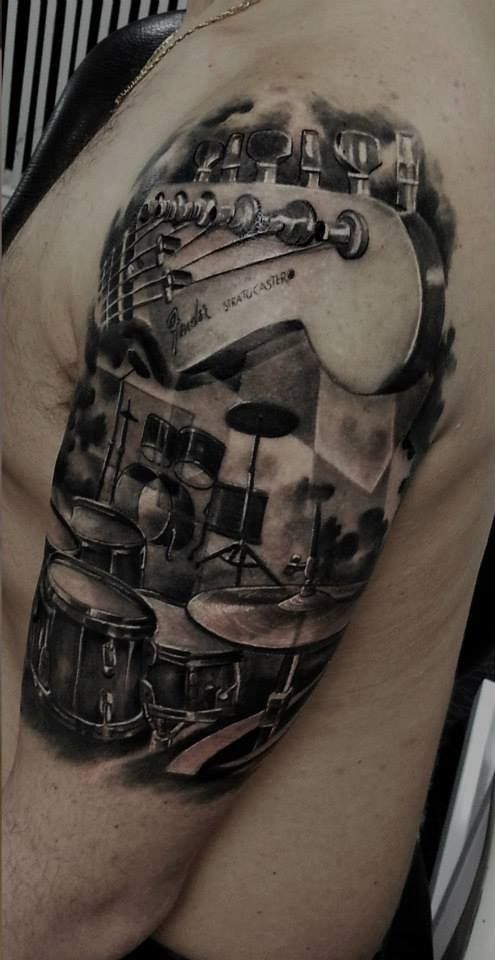 Tattoo. Drums and guitar.