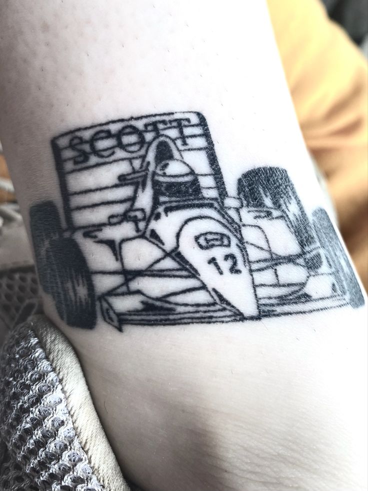 Race car tattoo