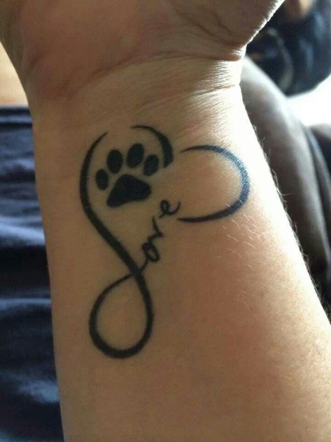http://tattoomagz.com/adorable-dogs-tattoos/simple-love-and-dogs-tattoo/