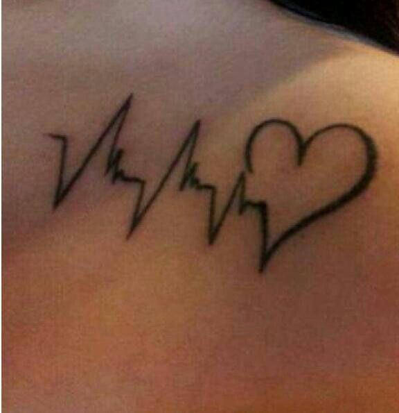 Love this heartbeat tattoo