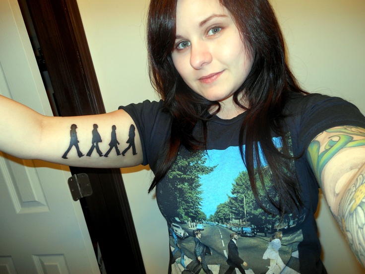My newest tattoo! Beatles on abbey road & I'm in my abbey road shirt. :)