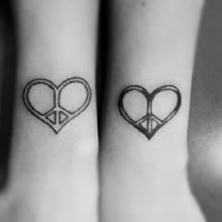 BFF Tattoos.....I kinda now wish we would have gotten heart shaped peace signs.. I still love ours though. It needs a touch up where it got gouged by that note book.