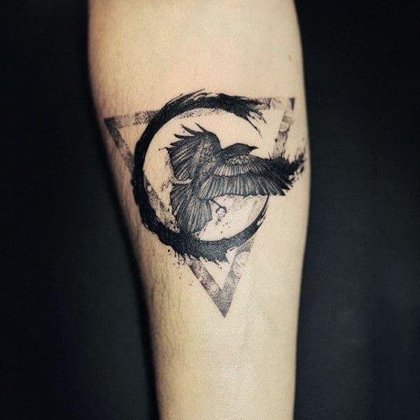 Raven Tattoo Designs: Symbolism and Style Combined
