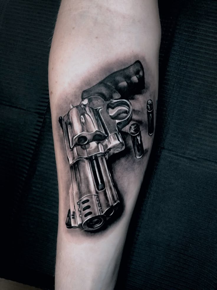 Gun tattoo