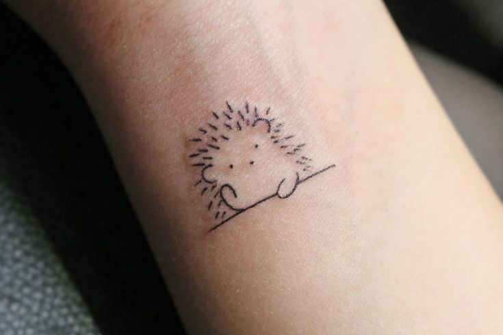 minimalist hedgehog tattoo