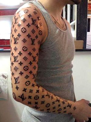Louis Vuitton Tattoos-A Man Tattoos Himself In The Louis Vuitton In A Possible Homage To Scott Campbell