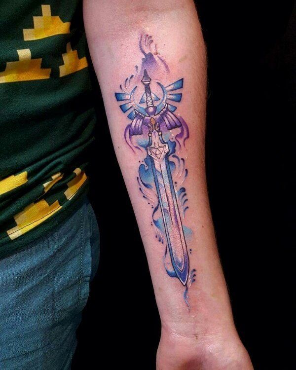 5,918 Likes, 51 Comments - #1 PAGE ABOUT GAMING TATTOOS! (@gamer.ink) on  Instagram: “Watercolor Master Sword tattoo done by @jazzytattoo. To submit  your work use the tag #gamerink And…”