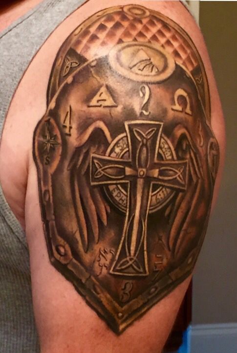 Shoulder armor tattoo