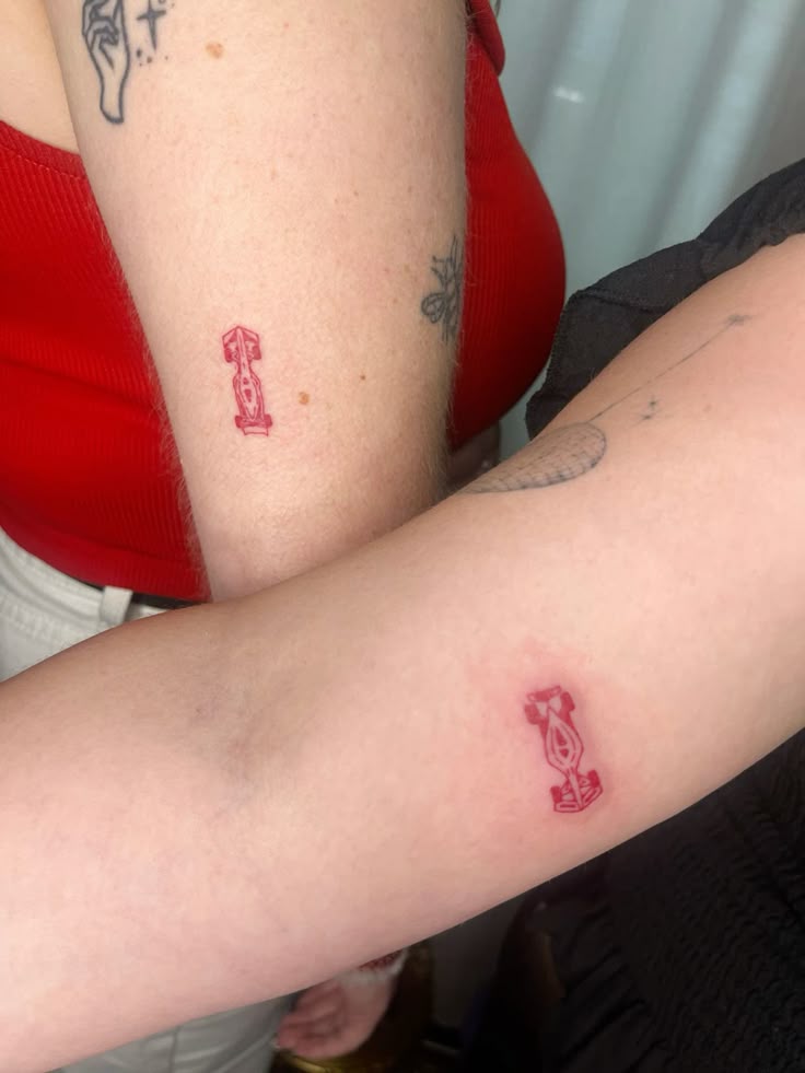Matching F1 Tattoos