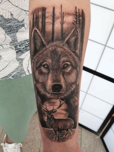 Top 12+ Best Wolf & Deer Tattoo Designs