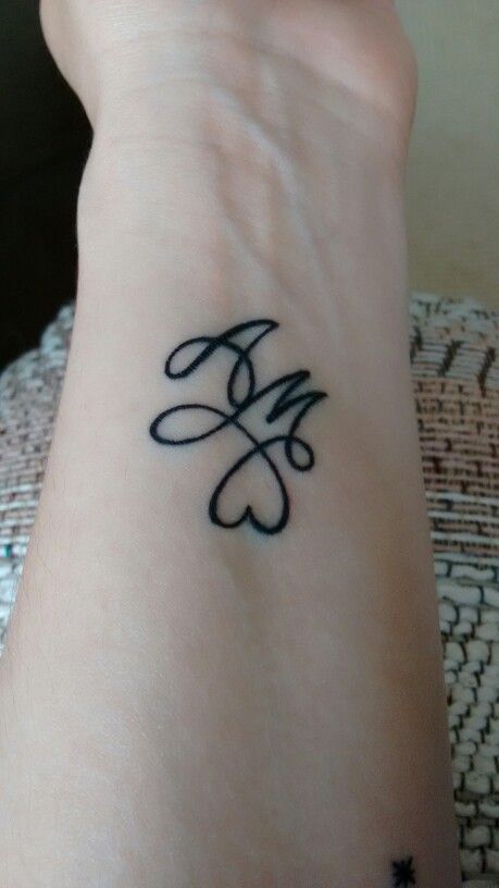 Couples tattoo with our initials