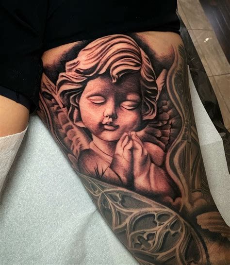 Small Baby Angel Tattoo Designs