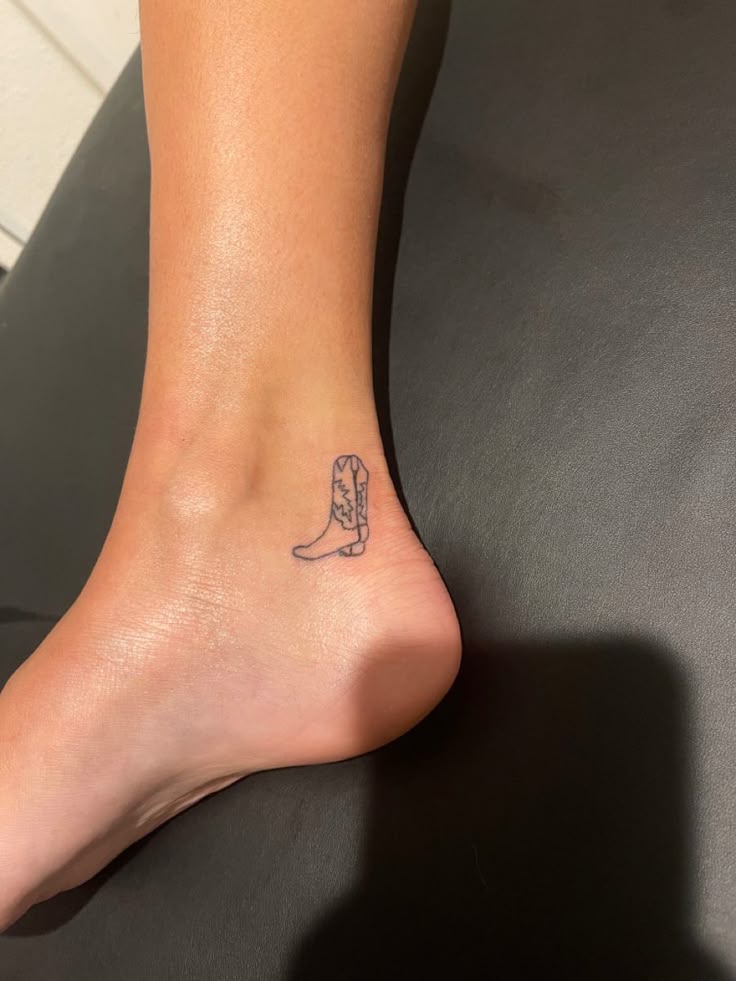 cowboy boot tattoo