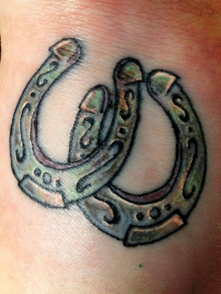 Newest tattoo, horseshoes in the hope they bring me some luck!!