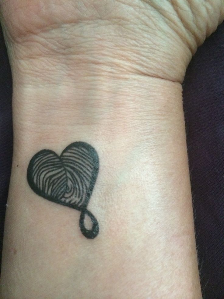 My new tat!! Heart/infinity with my 2 kids fingerprints.